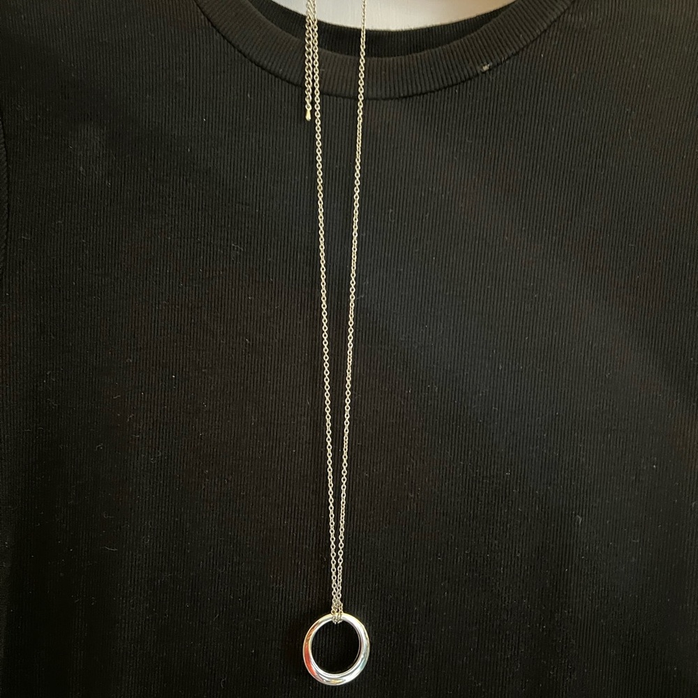Elegant Silver Necklace with Circular Pendant